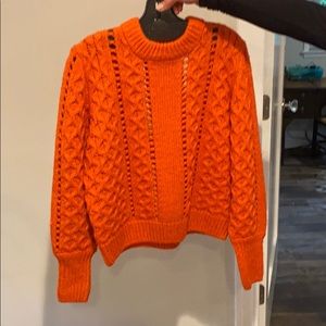 orange sweater